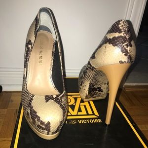 Snake skin heels, size 7.5